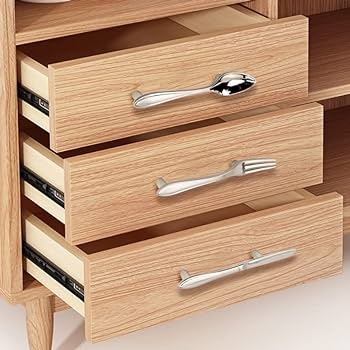 Dresser updated with new handles in a portable cabin bedroom